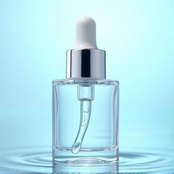 Pure Signature Serum dropper bottle with water droplets